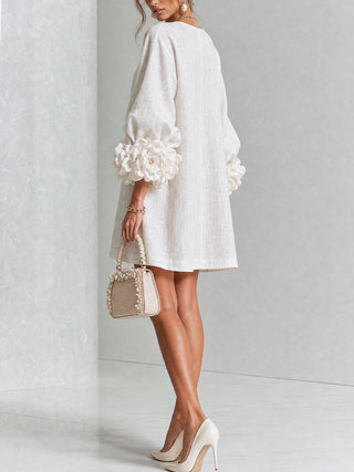 Anita | Mini vestido blanco con rosas en los puños